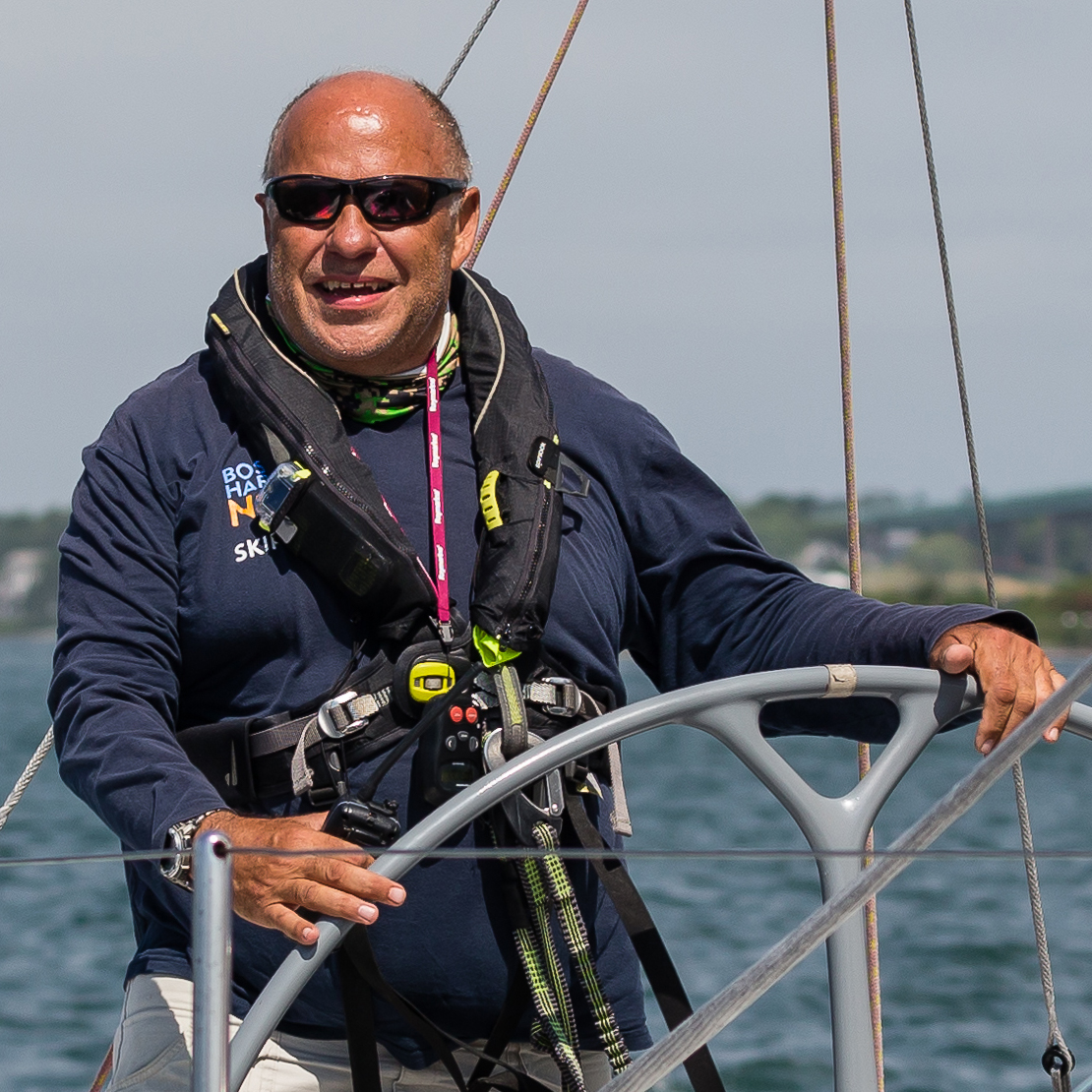 Philip Haydon driving a boat