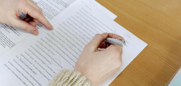 person editing a text